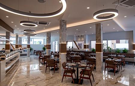 Porto Greco Village Beach slide 5