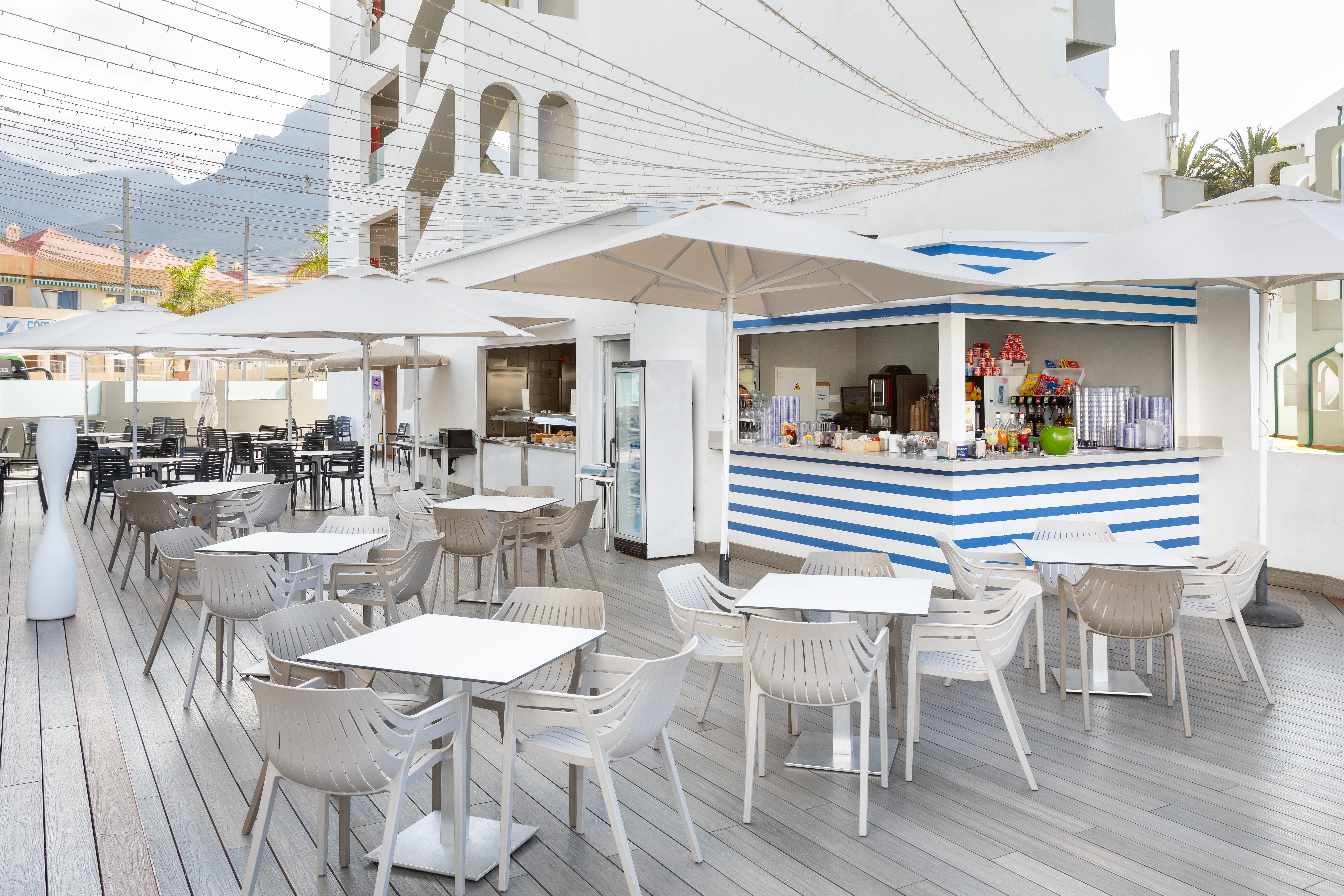 Playa Olid Suites and Apartments slide 2